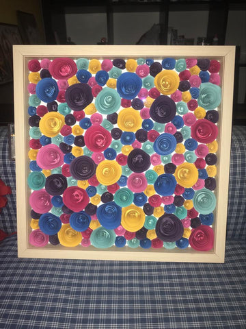 Paper flowers in a shadow box