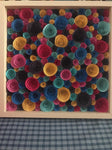 Paper flowers in a shadow box